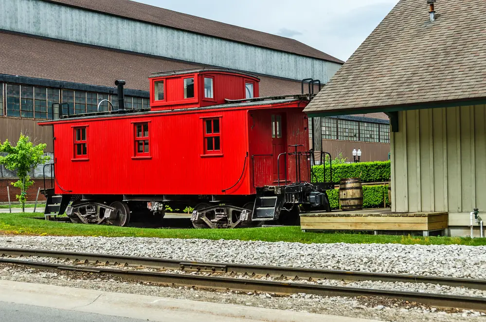 Bright red caboose on display in Manistee, Michigan