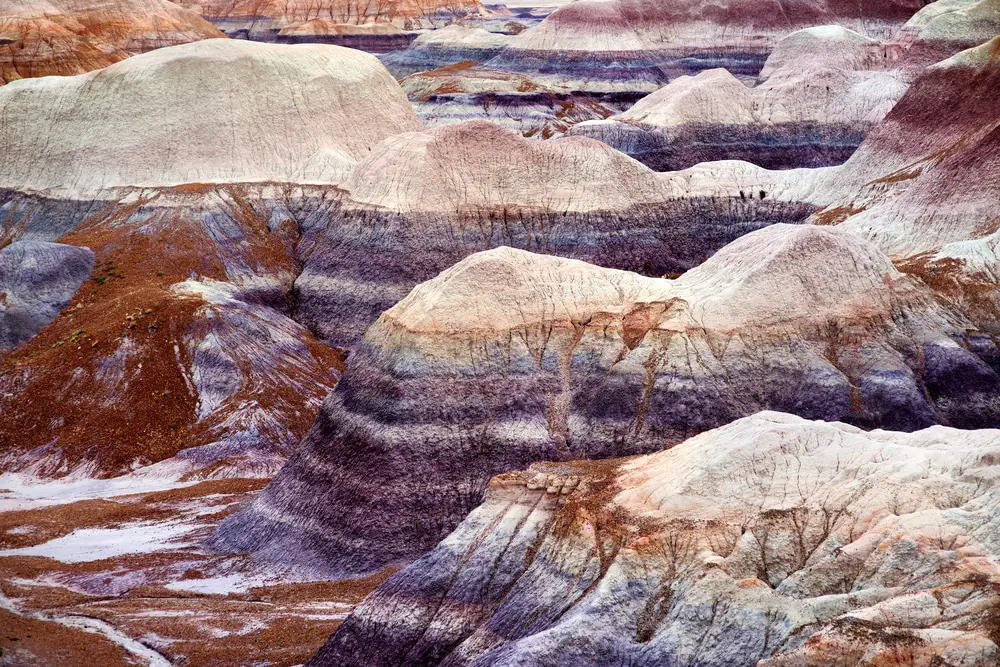 amtrak journey phots of striped purple sandstone formations