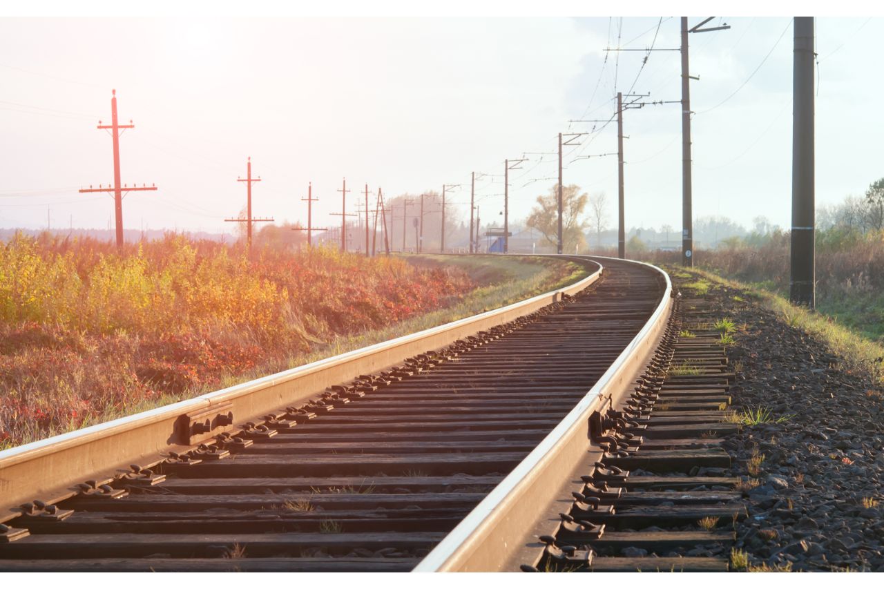 railroad tracks in the sunrise