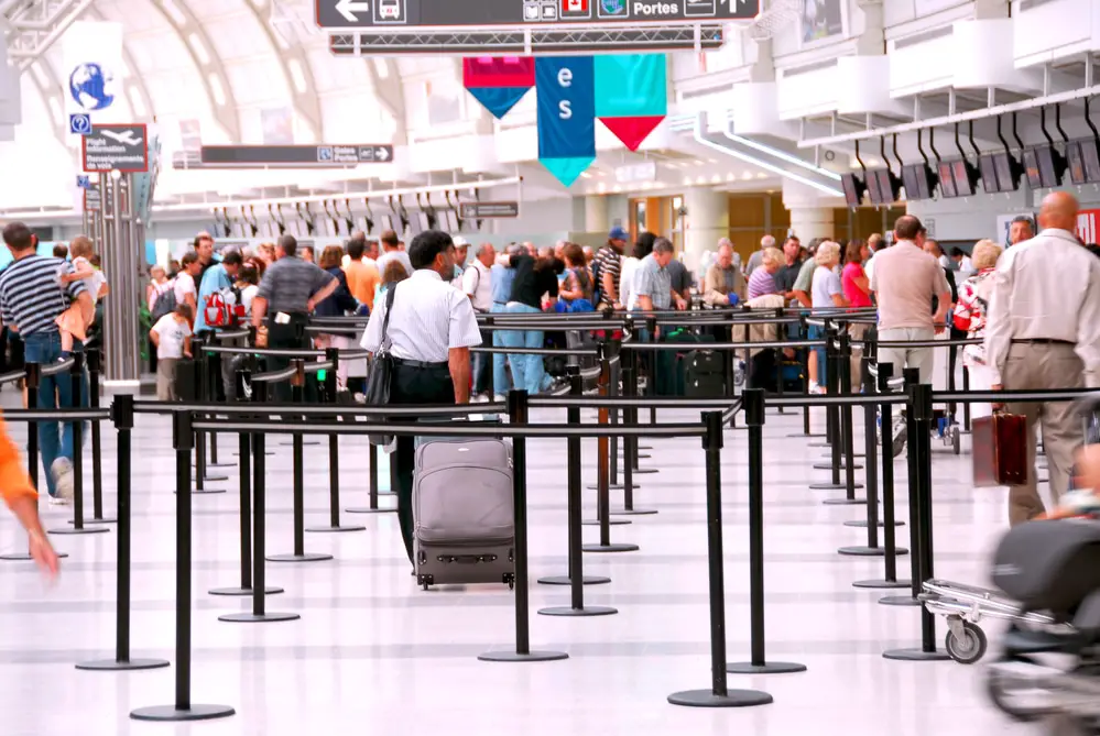 busy airport crowd during thanksgiving holiday