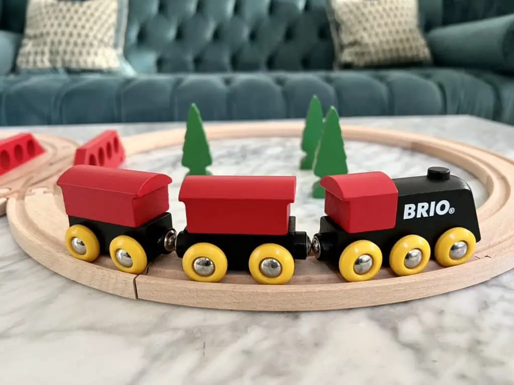 brio wooden train on the tracks
